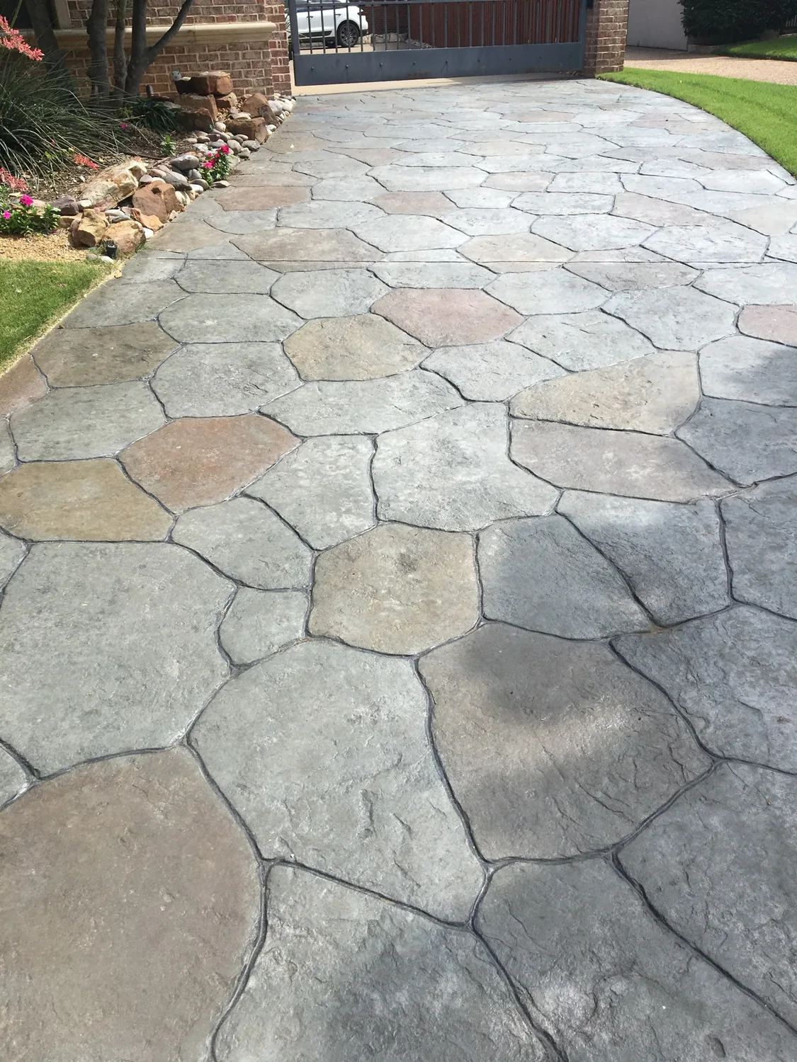 A stamped patio transformation by Lucky&rsquo;s Concrete in Leander